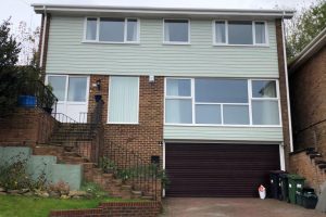New James hardie cladding with new windows, soffit and fascia plus new guttering 1