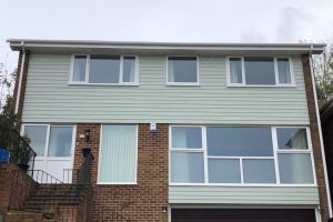 New James hardie cladding with new windows, soffit and fascia plus new guttering 2
